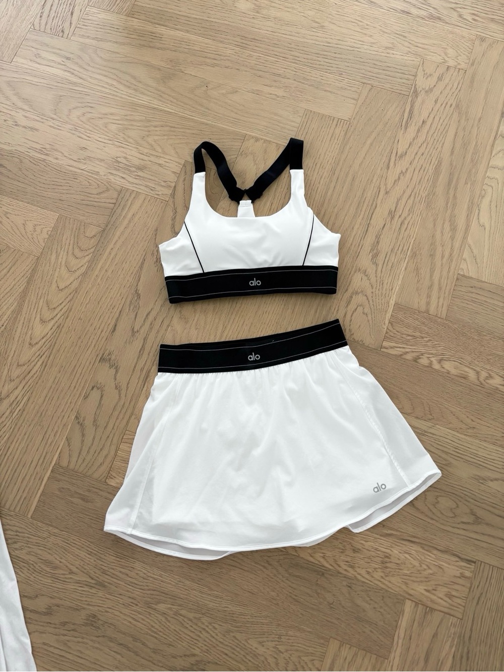 ALO Yoga White and Black Sport Bra & Skort Set